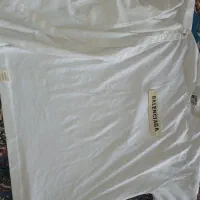 یک عدد تک پوش نو و یک عدد پیرهن|کفش و لباس بچه|مسجد سلیمان, |دیوار