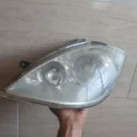 چراغ جلو تیبا سمت راننده موتور دار