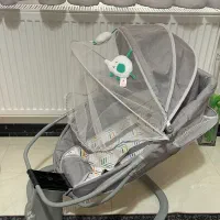 گهواره برقی و کریر نوزاد