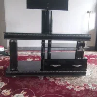 میز تلوزیون شیشه ای دو کشو کاملا سالم