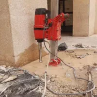 کرگیر یاگردبر  بتن وکاشت میلگردباچسب درمیبد