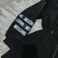 کاپشن مشکی|لباس|قدس, شهرقدس|دیوار