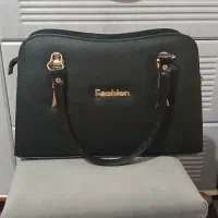 کیف|کیف، کفش، کمربند|زنجان, |دیوار