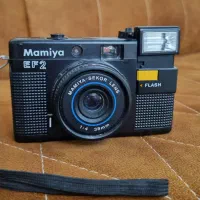 دوربین و سه پایه دوربین