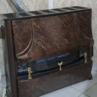 بخاری گازی طرح شومینه در حد نو