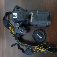 Nikon D5600 و لنز 18-140mm تمیز و درحد نو