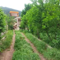 در محیطی دنج وآرام|اجارهٔ کوتاه‌مدت ویلا و باغ|رودبار, |دیوار