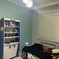 تخت کودک تمیز و همراه با ست کمد و فرش