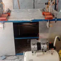 دستگاه بسته بندی دستمال کاغذی به همراه پمپ باد