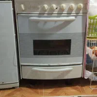 اجاق گاز و میز تلویزیون و ویترین و میز تحریر