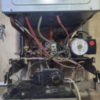 تعمیر و نصب انواع پکیج ،اسپلیت و رادیاتور|آبگرمکن، پکیج، شوفاژ|رباطکریم, رباطکریم|دیوار