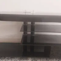 میز شیشه ای تلوزیون در حد نو