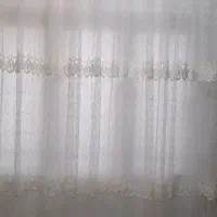 یک عدد پرده پانچ شده نو همراه با استر