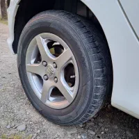 فروش ۴ عدد رینگ درحد نو و ۲ عدد چراغ خطر ۲۰۷درحدنو