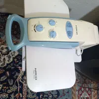 اتو بخار و ایینه و شمعدان
