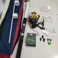 ست چوب وچرخ ماهیگیری