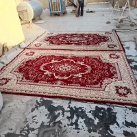 تعدادی فرش دستباف و ماشینی