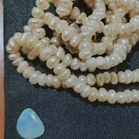 سنگ اوپال هفت رنگ و مروارید اصل