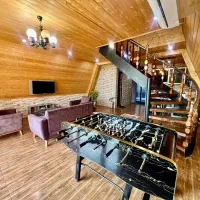 کلبه چوبی رمئو با فوتبال دستی|اجارهٔ کوتاهمدت ویلا و باغ|رامسر, |دیوار