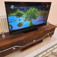 تلویزیون سامسونگ ۴۰ اینچ و میز تلویزیون