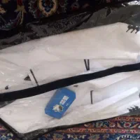 کت مجلسی پسرانه و پاپیون سفید