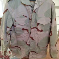 لباس و پوتین مرزبانی|لباس|قره ضیاالدین, |دیوار