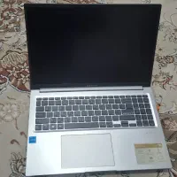 لپ تاپ ایسوس vivobook به همراه کول پد و موس