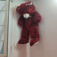 تخت ،خرس و دو کمد