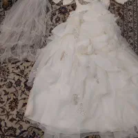 لباس عروس همراه با کت و تور سر