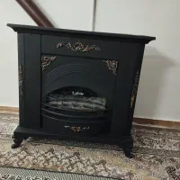 بخاری گازی طرح شومینه در حد نو