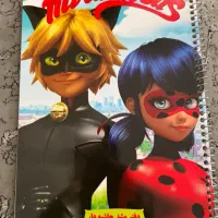 دفتر مشق ۴۰ برگ حاشیه دار دختر کفشدوزکی