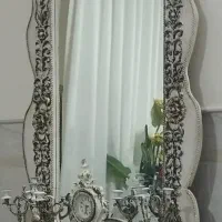 اینه شمعدان و میز تی وی