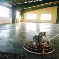 اجرای بتن ریزی کف با دستگاه ماله پروانه ای صیقل