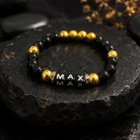 دستبند مهره‌ای مردانه مشکی و طلایی مدل MAX دست‌ساز