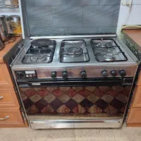 اجاق گاز فردار همراه با دوعدد جوجه گردان