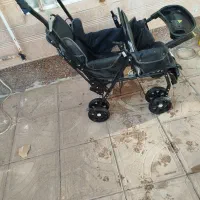 باسلام یک کالسکه دوقلو با یک عدد کهریه هر دو سالم