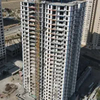 تهاتر برج در حال ساخت با ملک و زمین سند دار کرج