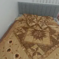 رو تختی دو نفره به همراه رو بالشی و کوسن