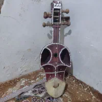 قیچک سروز بلوچی|سازهای سنتی|زاهدان, |دیوار