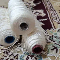 دکمه و نخ قیطون