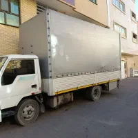 کارگر و ماشین اسباب منزل