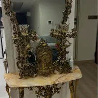 لوستر آینه کنسول شمعدان ساعت دیوارکوب برنز