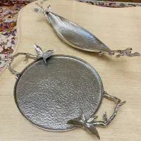 ظروف الومینیومی و میز و دیوار کوب