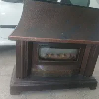 بخاری طرح شومینه|بخاری، هیتر، شومینه|مهاجران, |دیوار