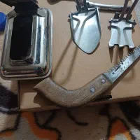 چراغ الکلی و بیلچه و چنگک و انبر و اره قدیمی