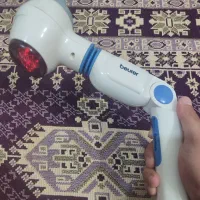 ماساژور همراه سنگ حرارت شیشه برند آلمانی beurer