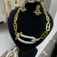 نیم ست با آبکاری طلا به همراه دستبند
