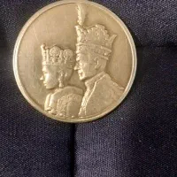 سکه تاجگذاری پهلوی و نیم ریالی نقره