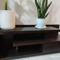 میز تلویزیون چوبی شکستگی نداره