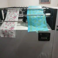 دستگاه رول کن سفره یکبارمصرف